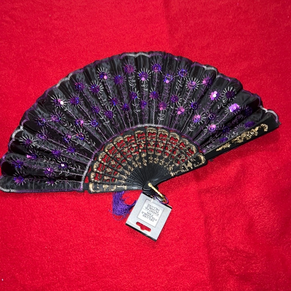- Victorian black hand held fan